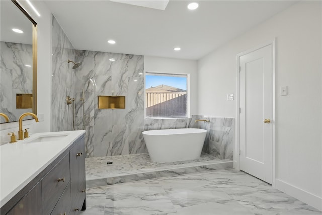 full bathroom with a marble finish shower, recessed lighting, marble finish floor, and vanity