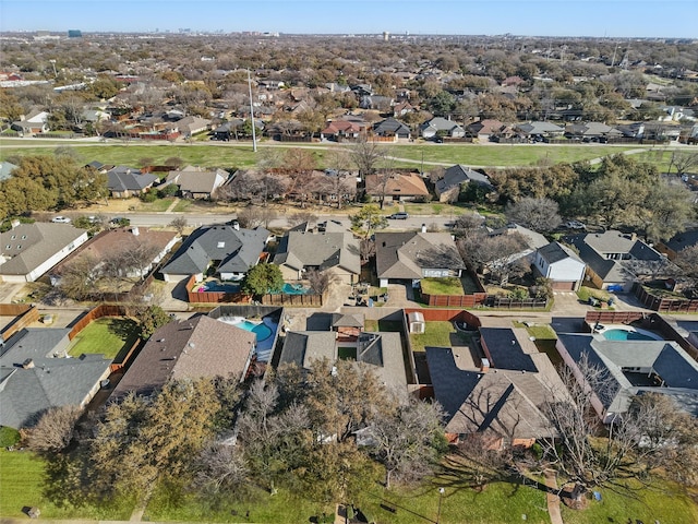 birds eye view of property with a residential view