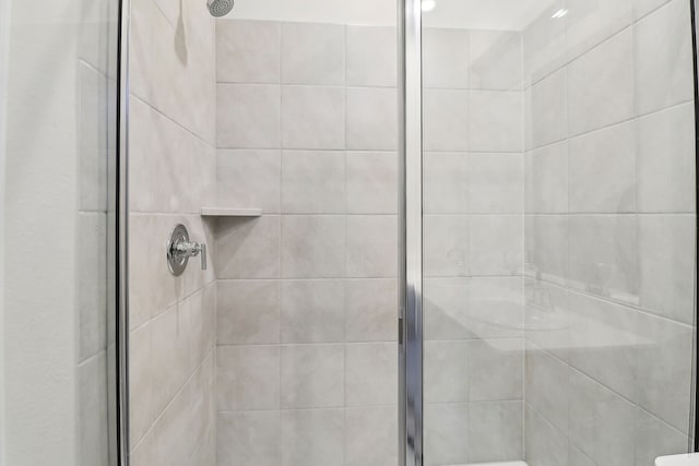 bathroom featuring a stall shower