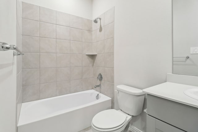 full bath with toilet, vanity, and  shower combination