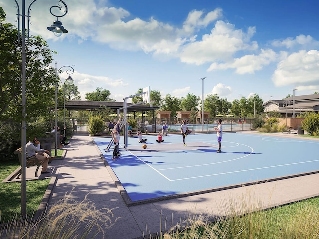 view of basketball court with community basketball court and fence