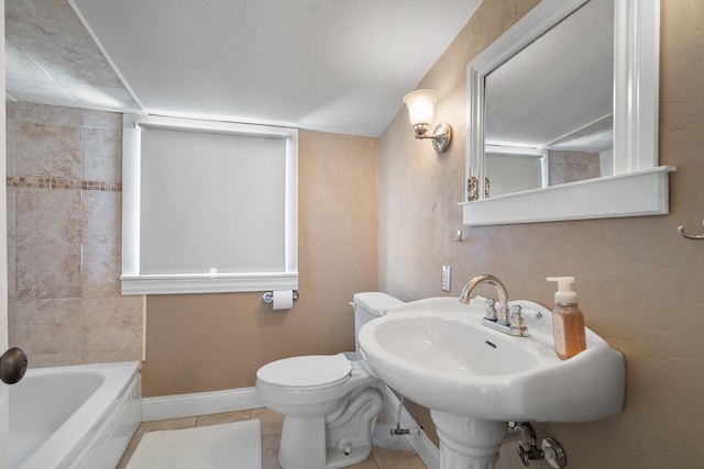 full bath with tile patterned floors, toilet, baseboards, and a sink