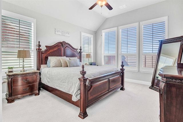 bedroom featuring a ceiling fan, baseboards, visible vents, lofted ceiling, and light colored carpet