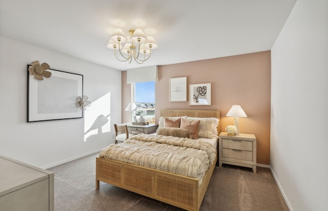 bedroom featuring baseboards, carpet, and a chandelier