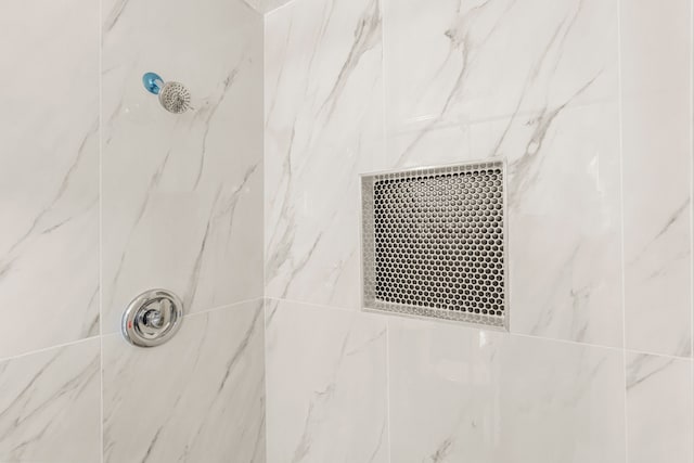 details with a marble finish shower