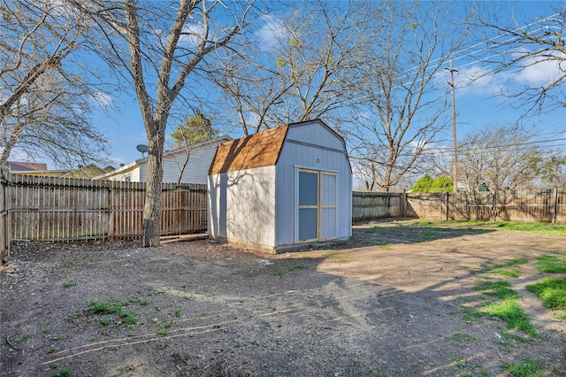 view of shed featuring a fenced backyard