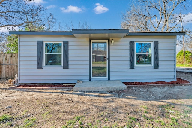 view of front of home with fence