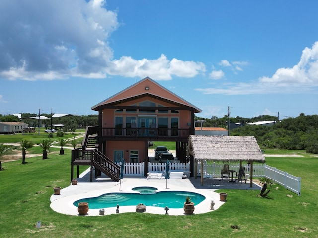 view of swimming pool with stairway, a gazebo, a fenced backyard, a yard, and a patio