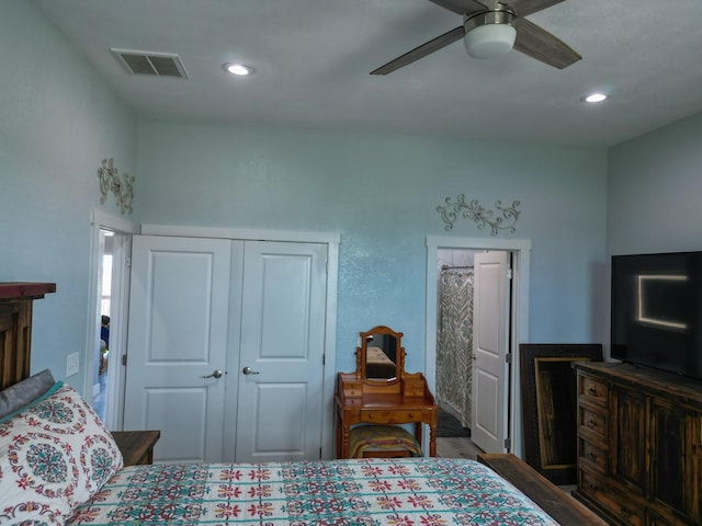 bedroom with a closet, visible vents, recessed lighting, and a ceiling fan