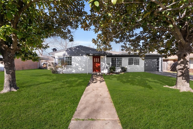 single story home with a front lawn and an attached garage