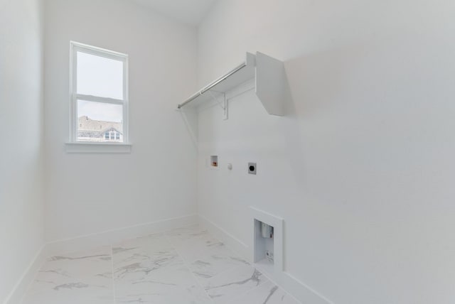 laundry area with marble finish floor, washer hookup, baseboards, hookup for an electric dryer, and laundry area