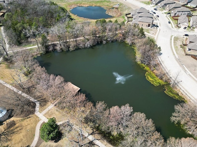 aerial view featuring a water view and a residential view