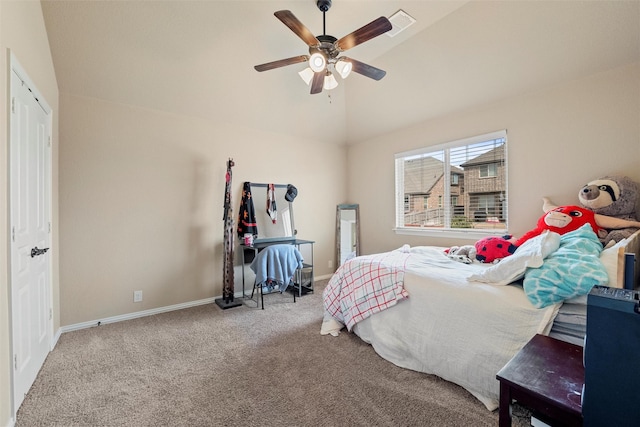 carpeted bedroom featuring visible vents, a ceiling fan, baseboards, and vaulted ceiling