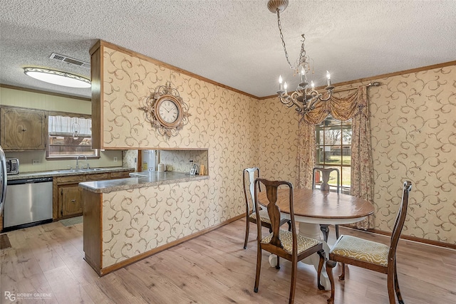 dining room with visible vents, wallpapered walls, crown molding, and light wood-style floors