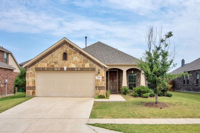 view of front of home with a front lawn, stone siding, roof with shingles, concrete driveway, and an attached garage