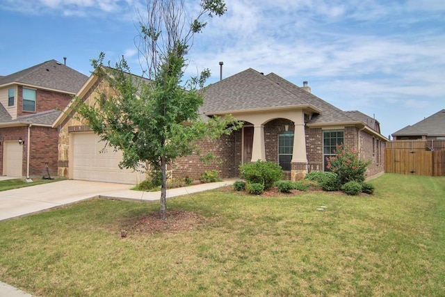 view of front of house featuring brick siding, driveway, a shingled roof, and a front lawn