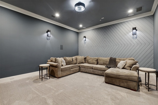 carpeted home theater with crown molding, recessed lighting, visible vents, and baseboards