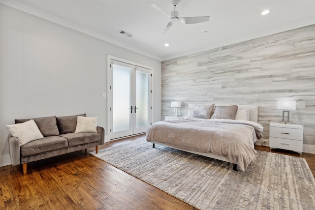 bedroom with visible vents, access to outside, wood finished floors, recessed lighting, and crown molding