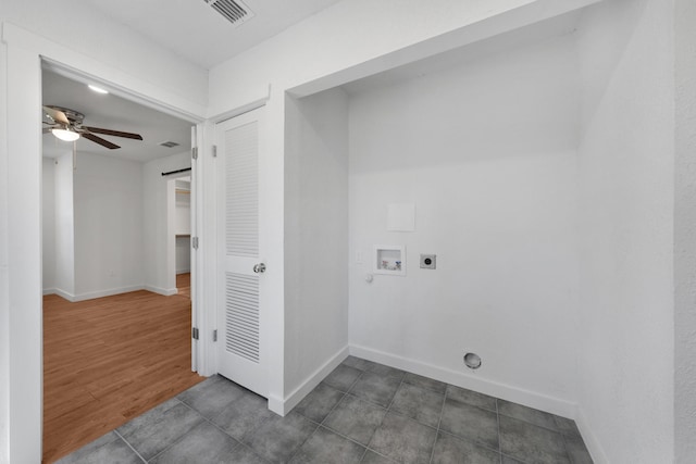 clothes washing area featuring visible vents, washer hookup, baseboards, hookup for an electric dryer, and laundry area