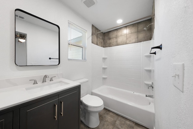 full bath featuring vanity, visible vents, tile patterned flooring, shower / tub combination, and toilet