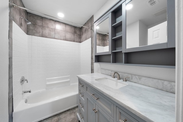 bathroom with tile patterned floors, visible vents, recessed lighting, bathing tub / shower combination, and vanity