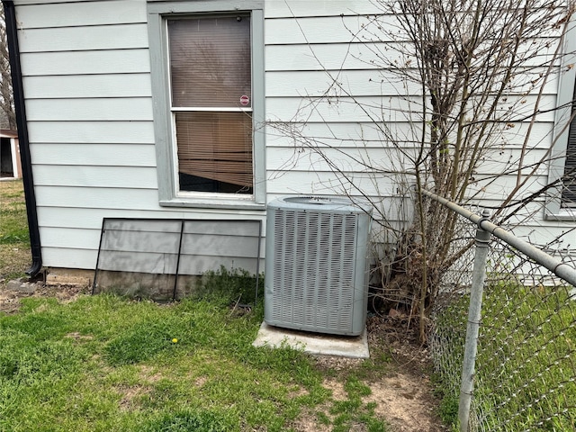 exterior details with cooling unit and fence