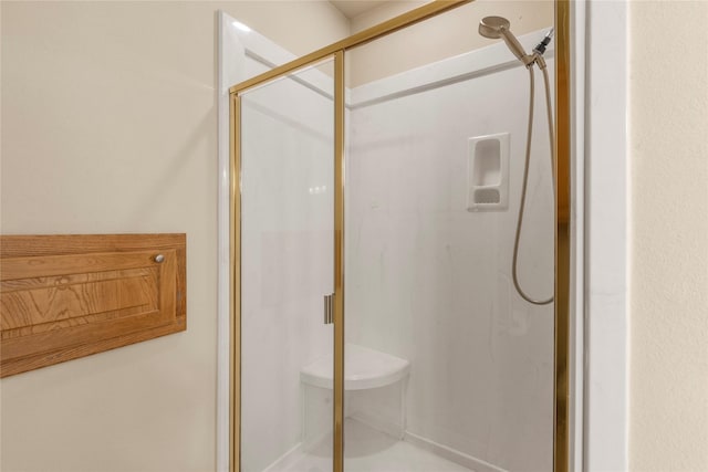 bathroom with a stall shower