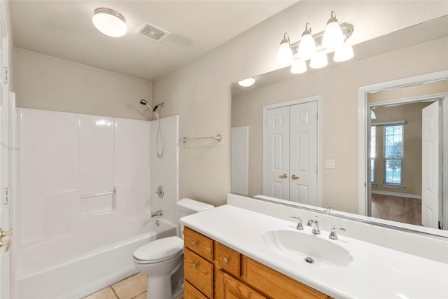 full bathroom with vanity, visible vents, bathtub / shower combination, tile patterned floors, and toilet