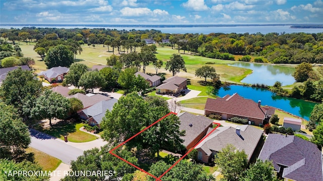 birds eye view of property featuring a residential view and a water view