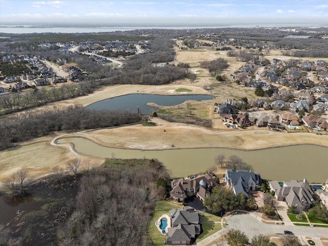 bird's eye view with a residential view, a water view, and golf course view