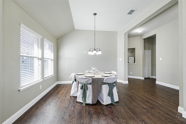 dining area featuring visible vents, dark wood-type flooring, baseboards, a chandelier, and vaulted ceiling