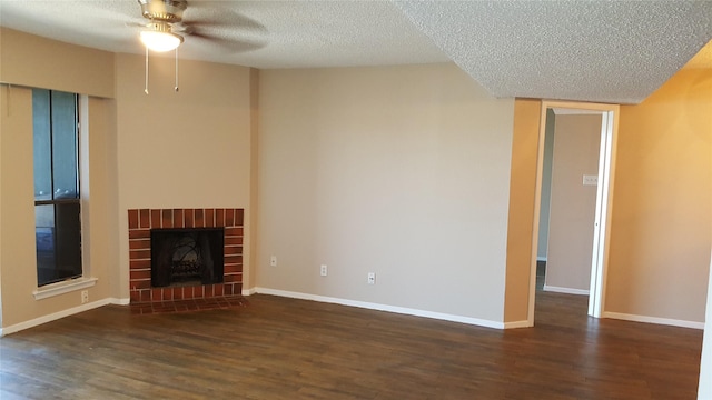 unfurnished living room featuring baseboards, a textured ceiling, ceiling fan, and wood finished floors
