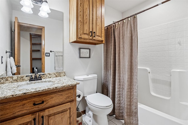 bathroom with shower / tub combo, toilet, vanity, and tile patterned flooring