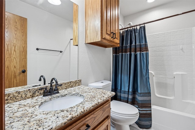 bathroom with shower / bath combo with shower curtain, toilet, and vanity