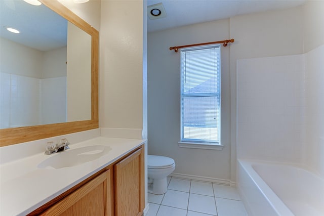 full bath featuring baseboards, toilet, vanity, and tile patterned flooring