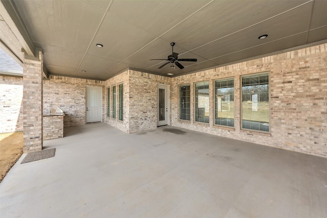 view of patio / terrace featuring a ceiling fan