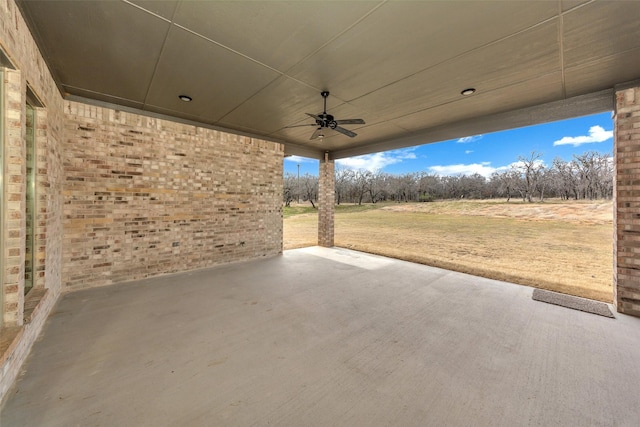 view of patio / terrace featuring ceiling fan