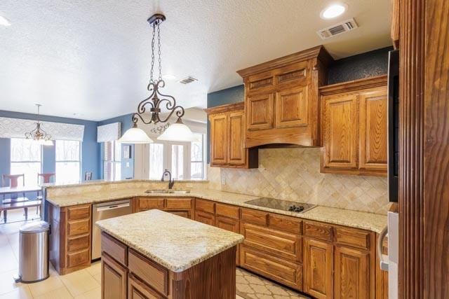505 Spring Valley Rd, Paradise, TX 76073 - kitchen featuring visible vents, stainless steel dishwasher, a sink, a peninsula, and a notable chandelier