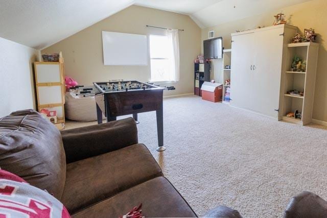 505 Spring Valley Rd, Paradise, TX 76073 - game room with vaulted ceiling, baseboards, and carpet