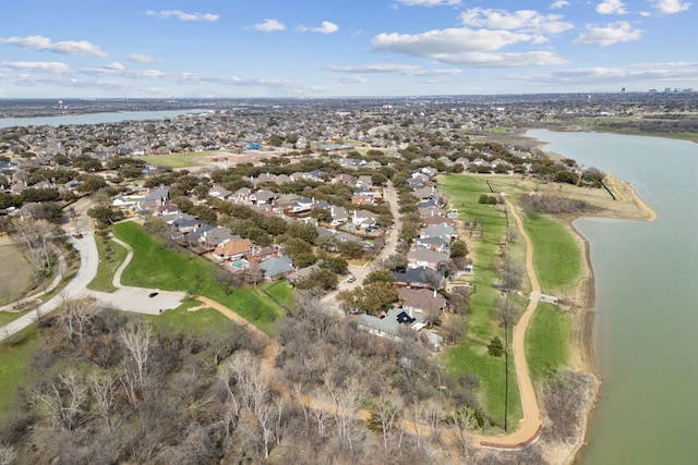 birds eye view of property featuring a residential view and a water view