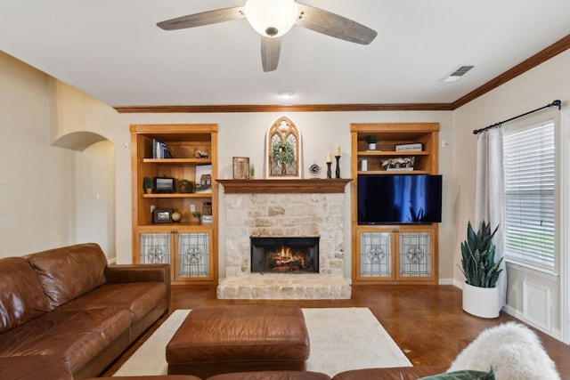 living room with built in features, visible vents, arched walkways, and ceiling fan