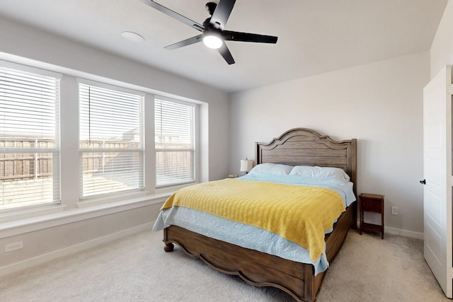 529 Hummingbird Dr, Celina, TX 75009 - bedroom with ceiling fan, baseboards, and light carpet