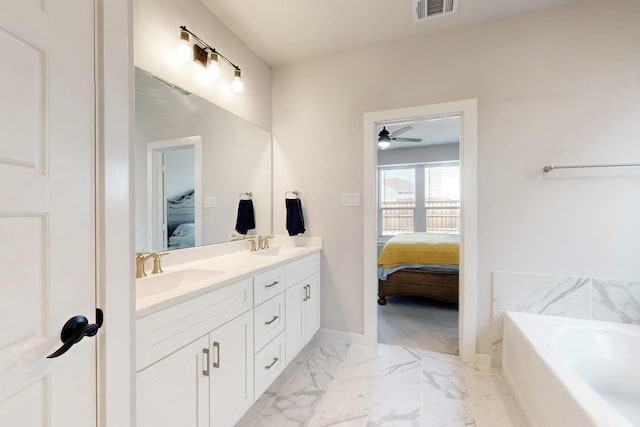 529 Hummingbird Dr, Celina, TX 75009 - ensuite bathroom with a bath, visible vents, ensuite bathroom, and a sink