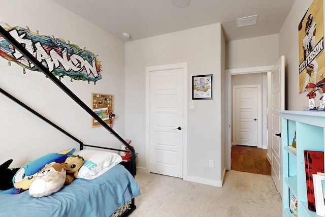 529 Hummingbird Dr, Celina, TX 75009 - bedroom featuring light colored carpet, baseboards, and visible vents