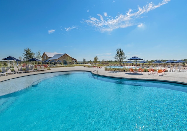 529 Hummingbird Dr, Celina, TX 75009 - pool with a patio