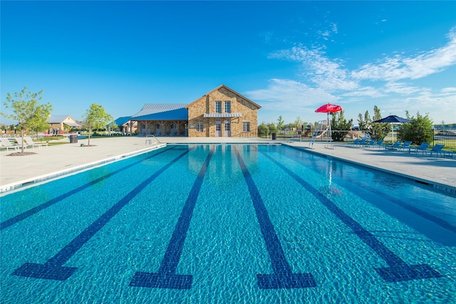 529 Hummingbird Dr, Celina, TX 75009 - pool with fence and a patio area