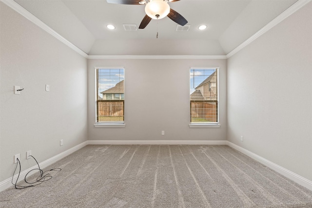 empty room with visible vents, plenty of natural light, and ornamental molding