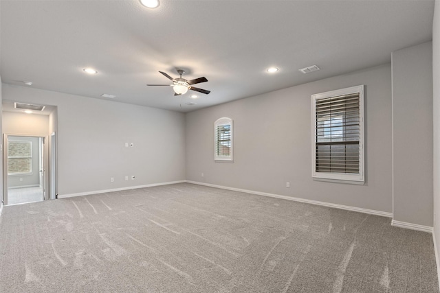 unfurnished room featuring recessed lighting, visible vents, and carpet floors