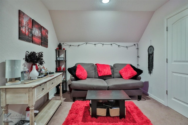 living area featuring baseboards, lofted ceiling, and carpet floors