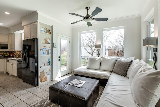 living room featuring light tile patterned floors, a ceiling fan, recessed lighting, and ornamental molding